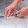 Cool_Tape_Sealing_FT_seam_with_hands_96535 Floor & Tunnel Shield II™ 106cm x 122cm - (42" x 48") DEI-50503